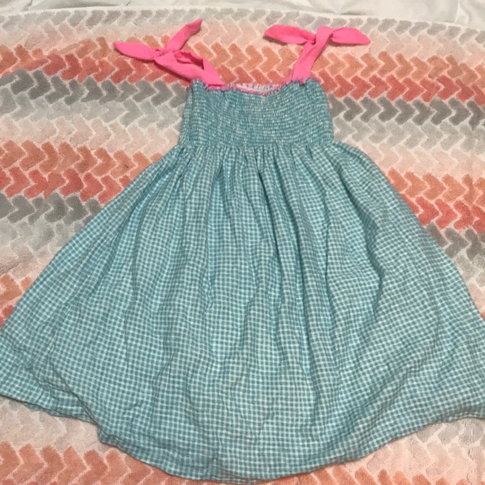 Blue gingham dress with bow sleeves